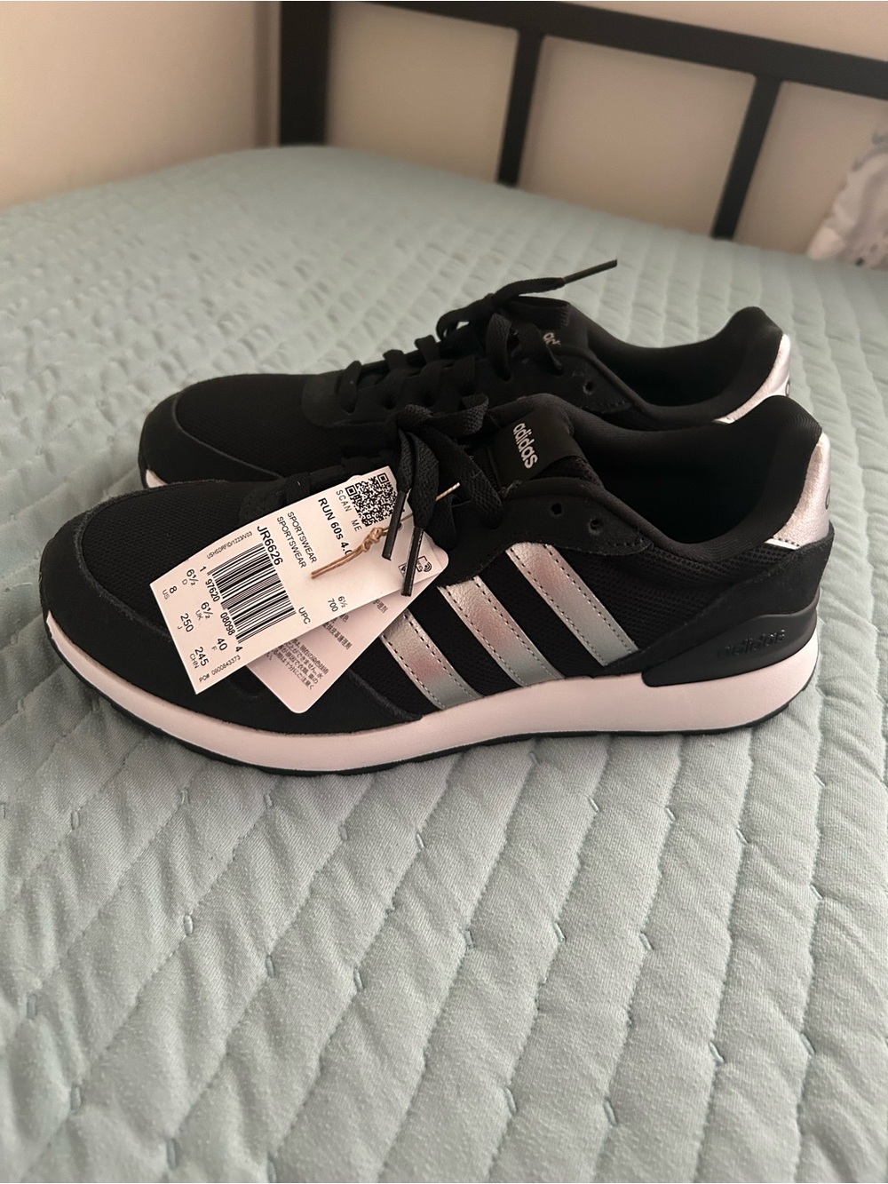 adidas Women’s Black Sneakers with Silver Stripes